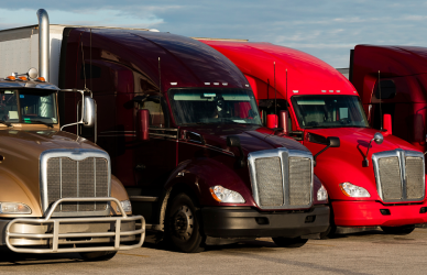 variety of parked semi trucks