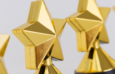 line of gold star trophies