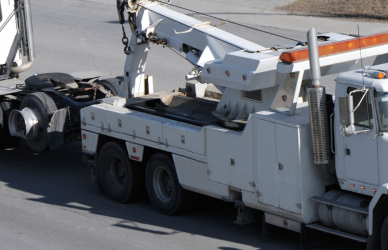 semi truck being towed