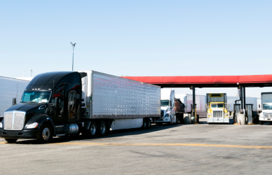 semi trucks at truck stop fuel island