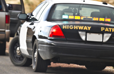 highway patrol vehicle pulling over suv
