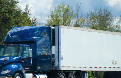 blue freightliner semi truck pulling white trailer, Daimler recalls freightliner and western star trucks for brake light issues