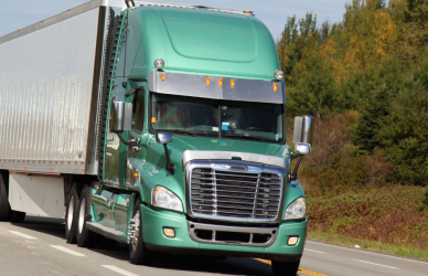 green semi truck with white trailer, atri survey on cargo theft