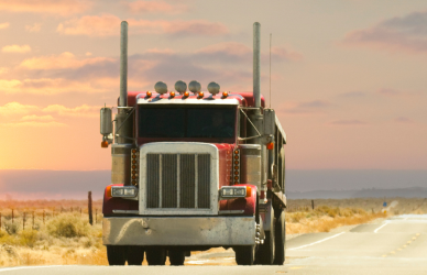 semi truck driving on road at sunset, careers for new truck drivers, entry-level, otr, specialized