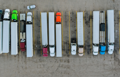 parked semi trucks in parking lot for semi trucks, truck parking