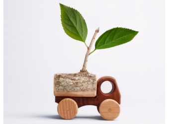 toy wooden eco truck with plant growing from trailer, California's Clean Truck Partnership is gaining traction as the California Air Resources Board (CARB) collaborates with major truck manufacturers to drive zero-emission vehicle development.
