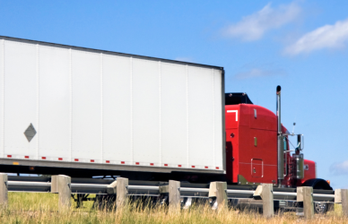 red semi truck on road