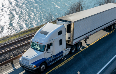 reefer semi truck on coastal highway