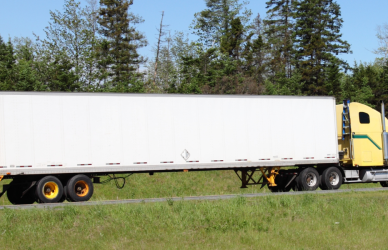 yellow semi with white trailer