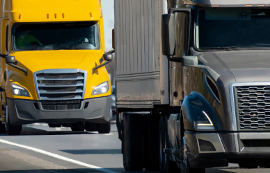 semi trucks on congested traffic road interstate