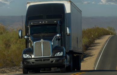 black semi truck on road