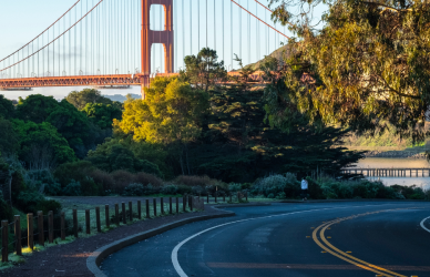 california highway with golden gate bridge in background