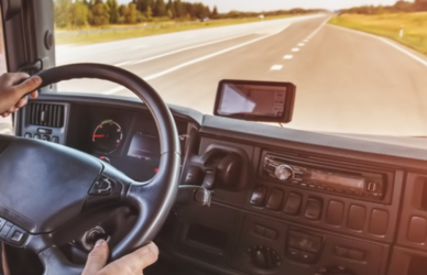 inside of semi truck while driving on road