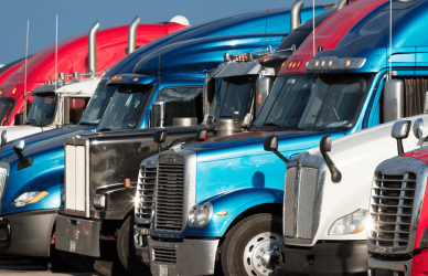 line of parked semi trucks