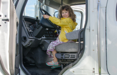 little girl in semi truck