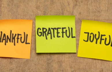 colorful post it notes with the words, loved, thankful, grateful, joyful, and blessed written on them