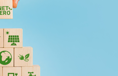 stacking blocks with green messaging, leading to net zero