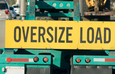 semi truck with oversize load banner