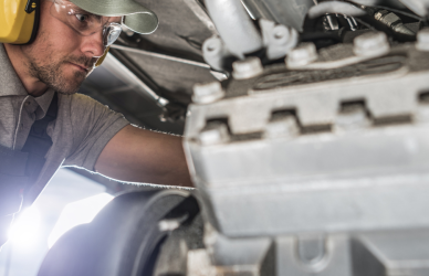Diesel Technician working on diesel engine
