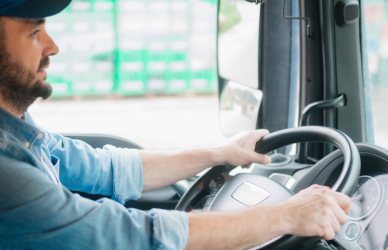 truck driver in semi truck cab
