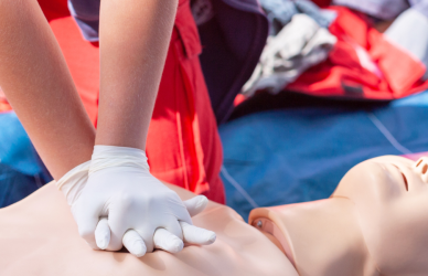 CPR certification training with CPR dummy