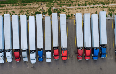 semi trucks parked in a row