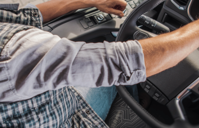Truck driver at the wheel of semi truck