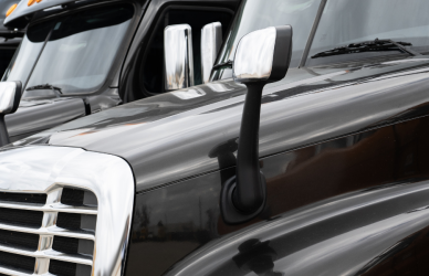 parked black semi trucks