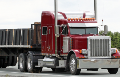 red flatbed semi truck