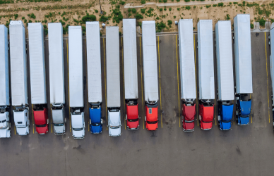 line of several parked semi trucks