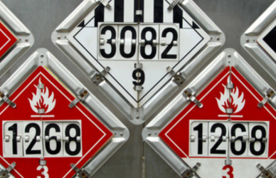 Hazmat signage on back of tanker truck