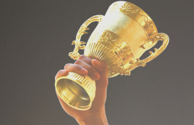 hand holding trophy high