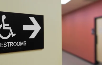 Sign pointing to restrooms