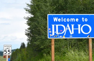 Welcome to Idaho sign on the side of the road