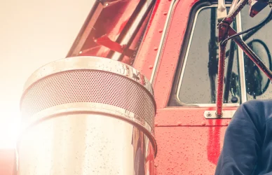 Man standing in front of semi truck