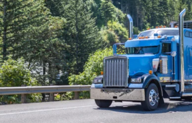 semi truck driving on road