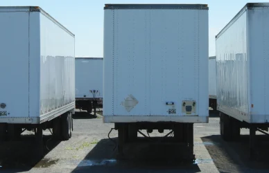 line of parked semi trailers