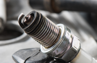 Image of spark plugs. This guide explains the science behind compression ignition, its benefits for truckers, and how diesel engines outperform gas engines in durability, fuel efficiency, and torque—perfect for heavy-duty vehicles.