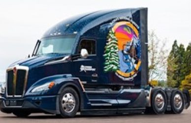 Kenworth is set to transport the 2024 U.S. Capitol Christmas Tree with their T680 truck, newly adorned with a custom graphics wrap, from Alaska's Tongass National Forest to the West Lawn of the U.S. Capitol.