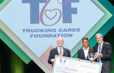 Dee Sova, a professional truck driver for Prime Inc., donates her $5,000 award from the Trucking Cares Foundation to Harmony House, a nonprofit in Springfield, Missouri, dedicated to supporting survivors of domestic violence.