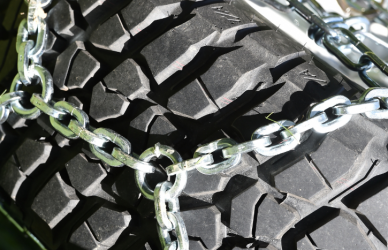 Colorado's proposed Senate Bill 69 could allow private roadside chain-assist services to help truckers comply with the state's strict tire chain laws. Learn how this legislation may impact winter trucking routes.