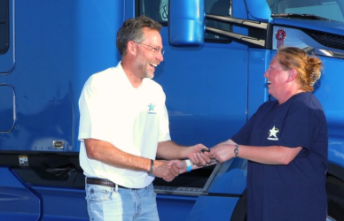 stacie simmons accepting landstar system inc 50th truck giveaway
